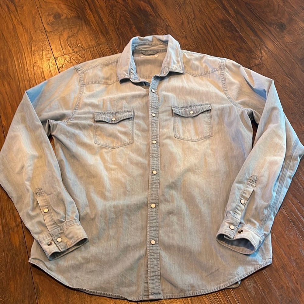 Blue button down shirt with pearl snaps